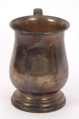 Lot 31 - A George V silver baluster tankard of plain...