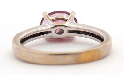 Lot 77 - A 14ct tourmaline and diamond ring, the oval...