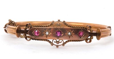 Lot 122 - An early 20th century 9ct ruby and diamond...