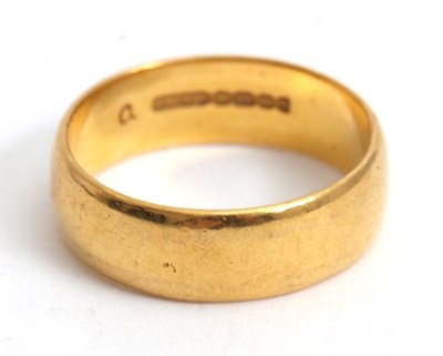 Lot 174 - A 22ct wedding band, 6mm wide, hallmarked...