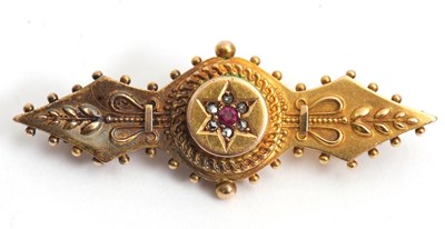 Lot 128 - A 15ct Victorian brooch, with central ruby and...