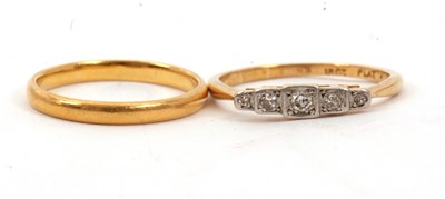Lot 20 - An 18ct and platinum diamond ring and 22ct...