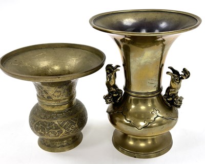 Lot 217 - A Chinese brass vase together with a further...