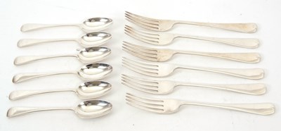 Lot 79 - Six George V silver table forks and six silver...