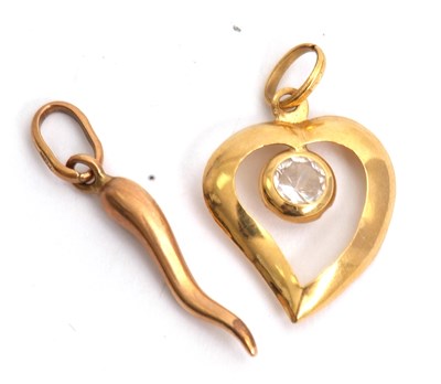 Lot 169 - Two gold pendants: the horn pendant with bale...