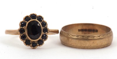 Lot 39 - A 9ct wedding band and a 9ct cluster ring: the...
