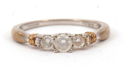 Lot 25 - A 9ct CZ ring, with three graduated CZ's set...
