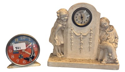 Lot 347 - A pair of circus-themed clocks