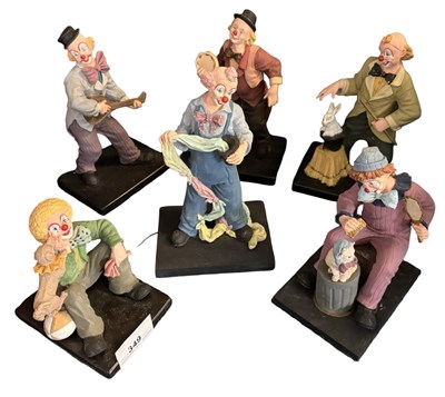 Lot 349 - A group of contemporary clown models on...