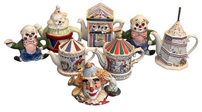 Lot 351 - A group of circus and clown themed teapots