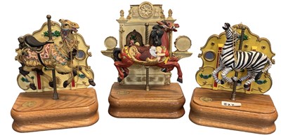 Lot 352 - Three circus-themed musical figurines