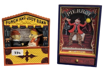 Lot 359 - A heavy metal Punch and Judy money box,...