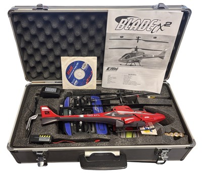 Lot 318 - A Blade CX2 remote controlled helicopter in...
