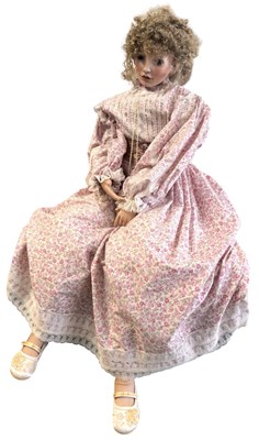 Lot 263 - An extremely large porcelain doll, marked to...
