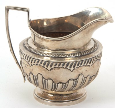 Lot 5 - An early 19th Century silver cream jug of...