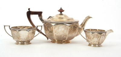 Lot 7 - A George V silver tea set of plain circular...
