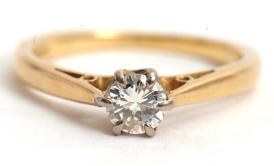 Lot 75 - An 18ct diamond solitaire ring, the round...
