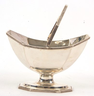Lot 32 - A Victorian swing handled pedestal sugar...