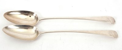 Lot 51 - A pair of George III silver basting spoons,...