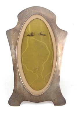 Lot 68 - A George V silver photograph frame of shaped...