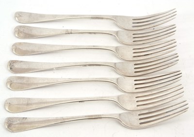 Lot 80 - A group of seven George III silver table forks,...