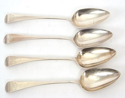 Lot 85 - Four Georgian silver serving spoons,...