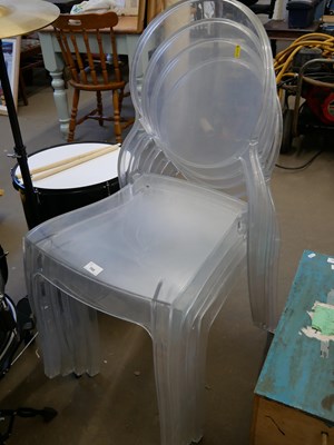Lot 768 - Four clear plastic stacking chairs