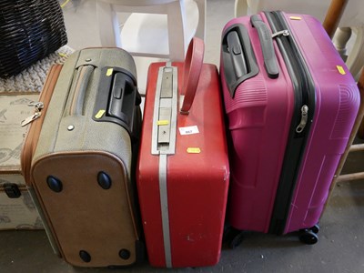 Lot 867 - Three assorted suitcases