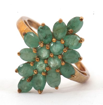 Lot 5 - A 9ct emerald cluster ring, the cluster formed...