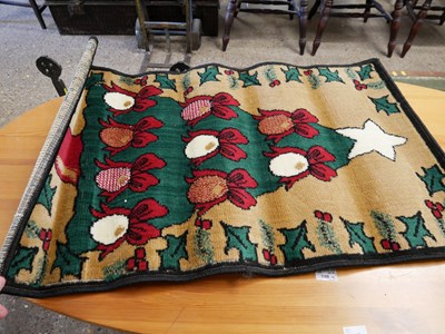Lot 316 - A modern floor rug decorated with a Christmas...