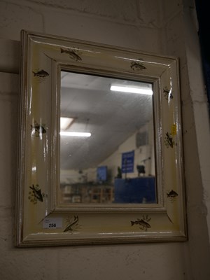 Lot 256 - A 20th Century wall mirror, the frame...