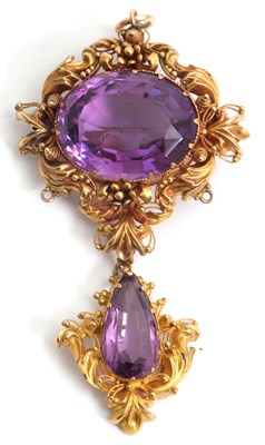Lot 98 - A Victorian amethyst brooch/pendant, comprised...