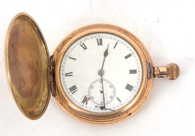 Lot 243 - A rolled gold Waltham Hunter pocket watch, key...