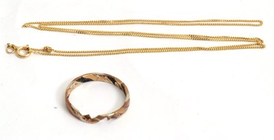 Lot 188 - A 9ct chain and a 9ct ring: the fine chain...