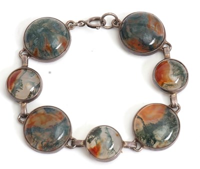 Lot 215 - A moss agate bracelet, with round moss agate...
