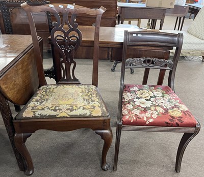 Lot 478 - A Georgian mahogany bar back sabre leg dining...