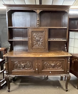 Lot 491 - A Victorian Gothic carved oak dresser, the top...