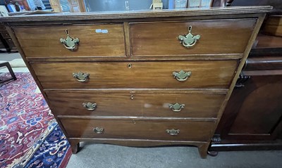 Lot 498 - A late Georgian mahogany chest of two short...