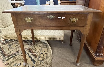 Lot 503 - A George III oak single drawer side table...