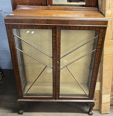 Lot 524 - An Edwardian walnut veneered china display...