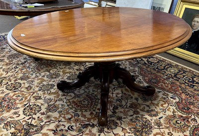 Lot 560 - A Victorian oval mahogany dining table raised...