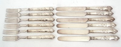 Lot 187 - A set of six pairs of Queens pattern dessert...