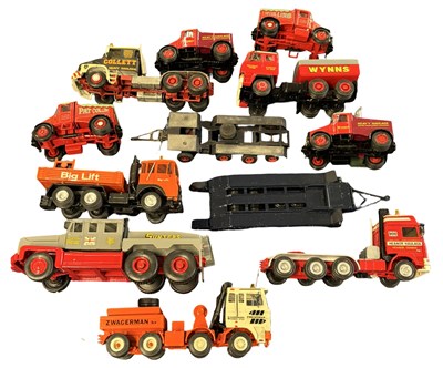 Lot 129 - A group of various die-cast model haulage cabs...