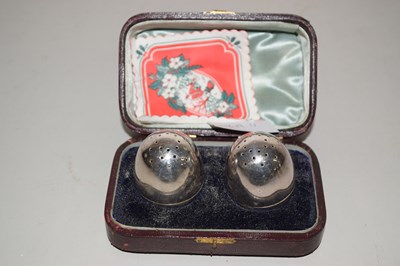 Lot 112 - Cased pair of silver plated cruets formed as eggs