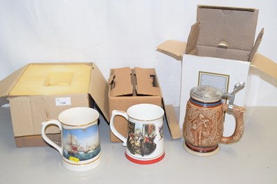 Lot 134 - Three various boxed collectors tankards viz...