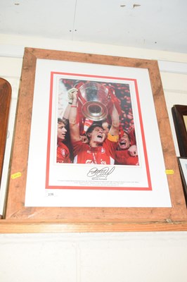 Lot 236 - A framed print of Steven Gerrard raising the...