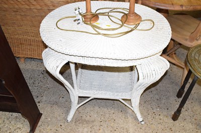 Lot 280 - A painted cane occasional table
