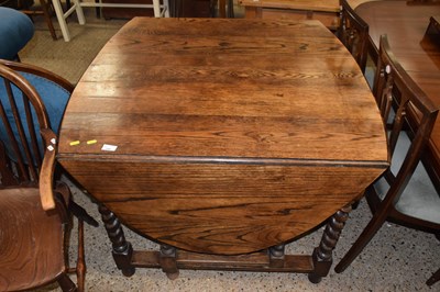 Lot 296 - An oak folding oval table, length approx 195cm