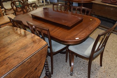 Lot 297 - A reproduction mahogany effect dining table...
