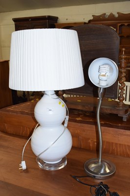 Lot 302 - A large decorative table lamp and shade...